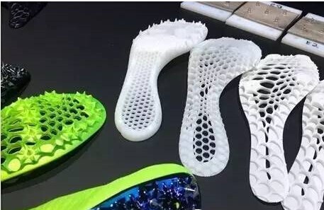 里约奥运火热进行 耐克为奥运打印跑鞋忙碌1.jpg